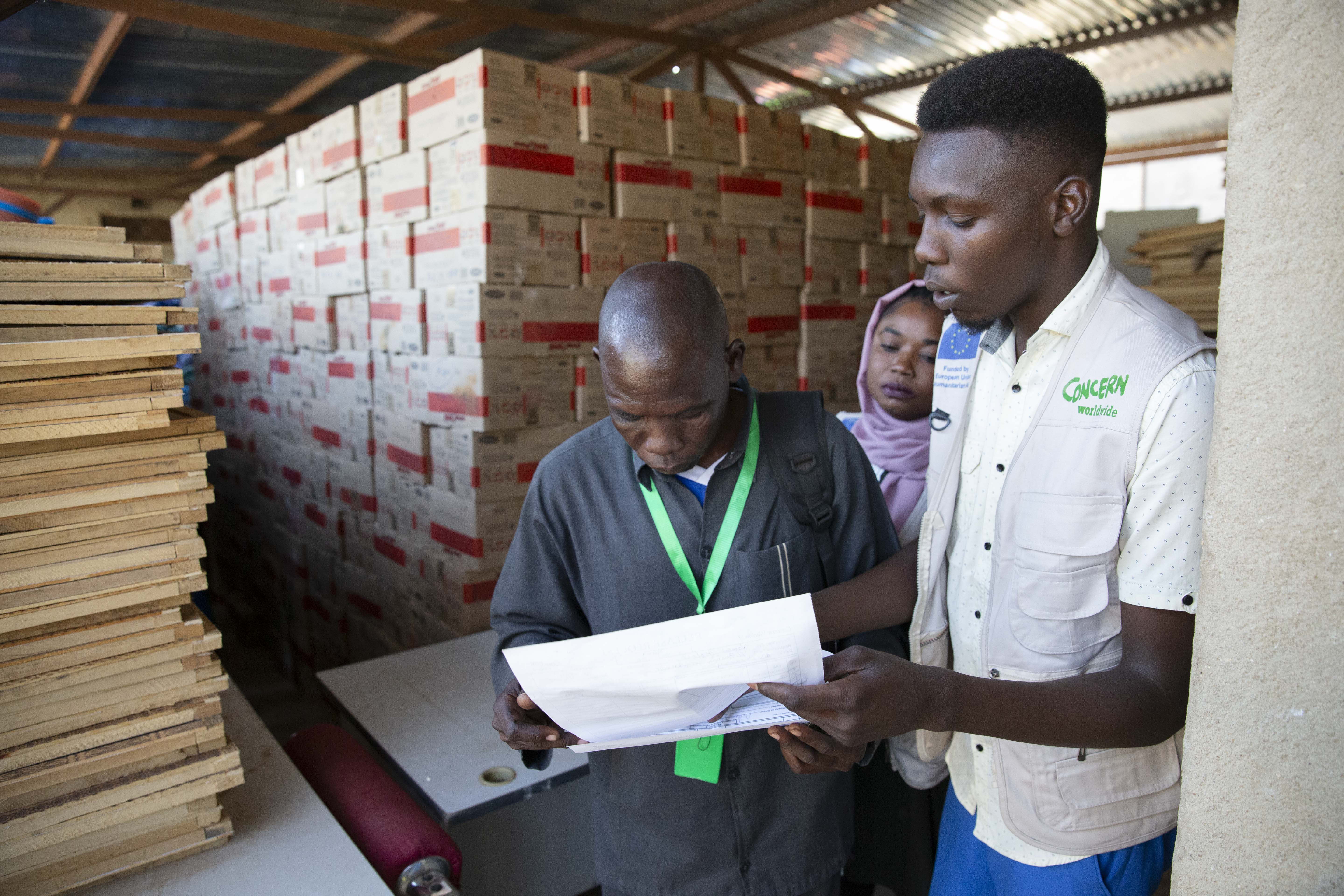 Concern staff delivering ready-to-use-therapeutic food 