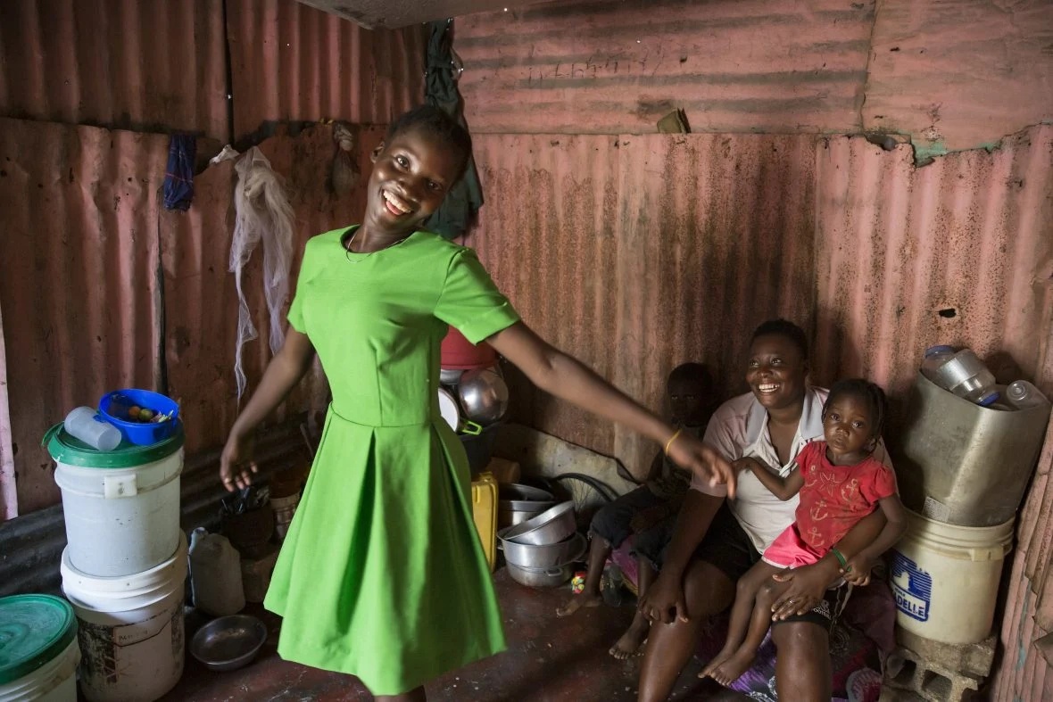 16 year old Émanise models her creations at the family home