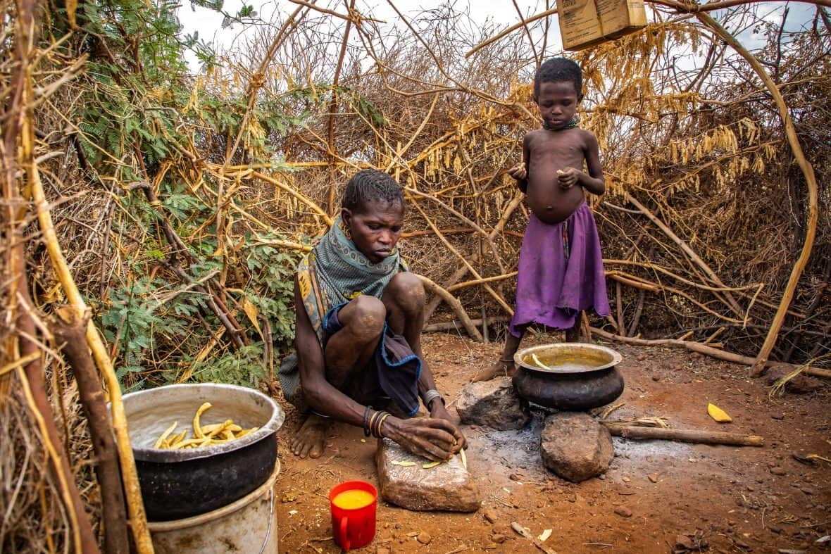 Woman prepares food for child