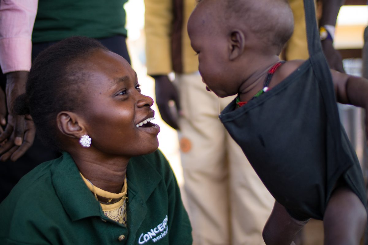 Concern worker with child