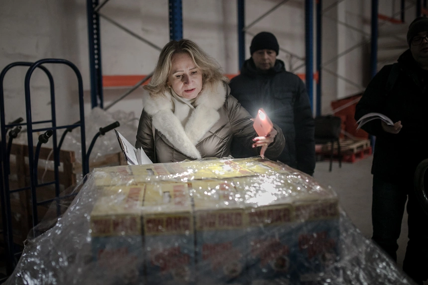 JERU staff inspect supplies that have arrived in Khemelnytskyi, Ukraine. (Photo: Simona Supino / Concern Worldwide)