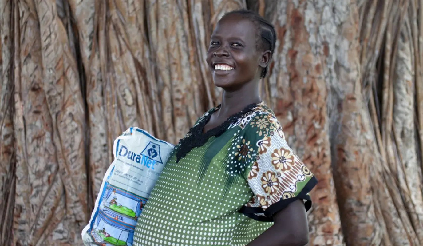 Chagawa* (28) at a Mobile Health Clinic in Mayomkuol, a remote rural area of Aweil, South Sudan. Chagawa has eight children and is 9 months pregnant with her ninth.