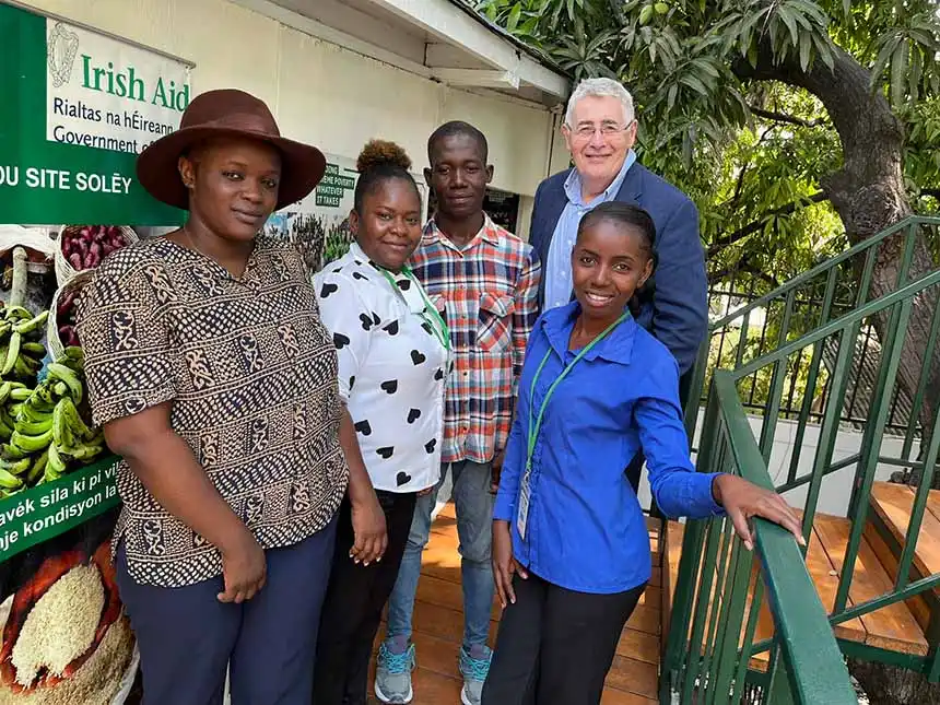 Dominic MacSorley with Haitian young people