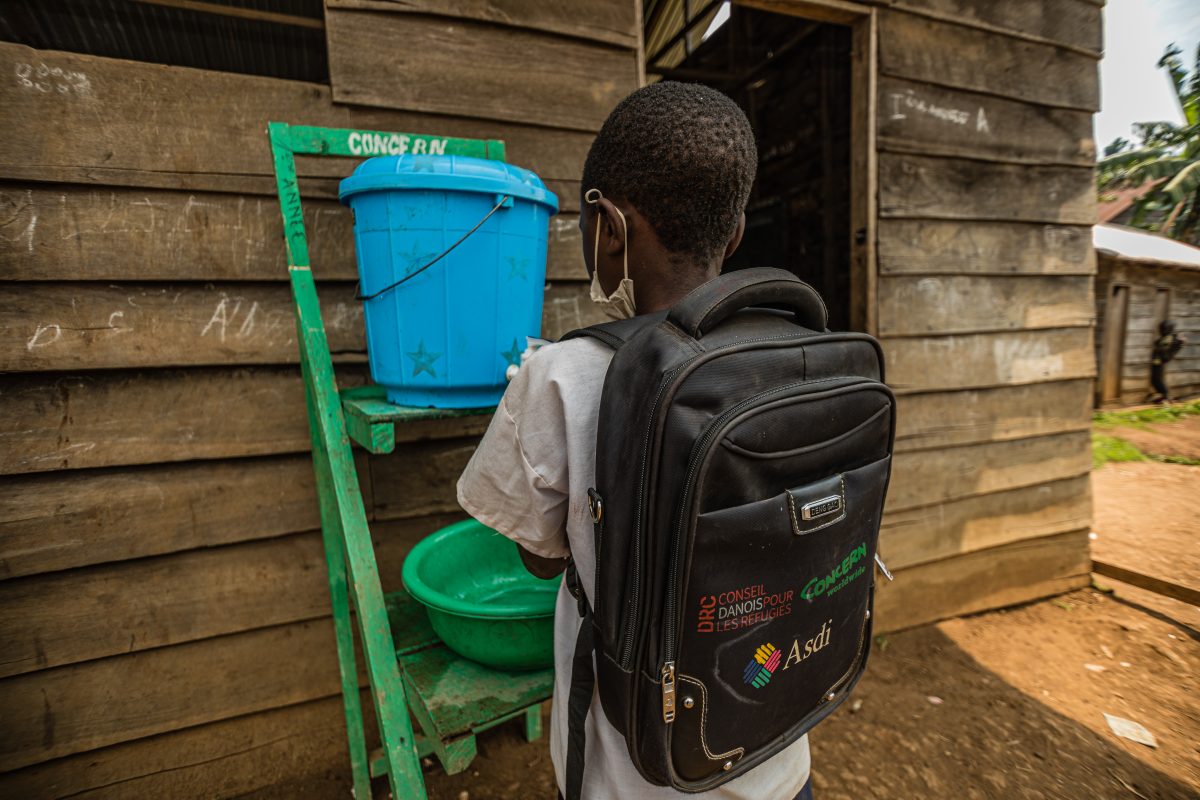 Child washing hands at school