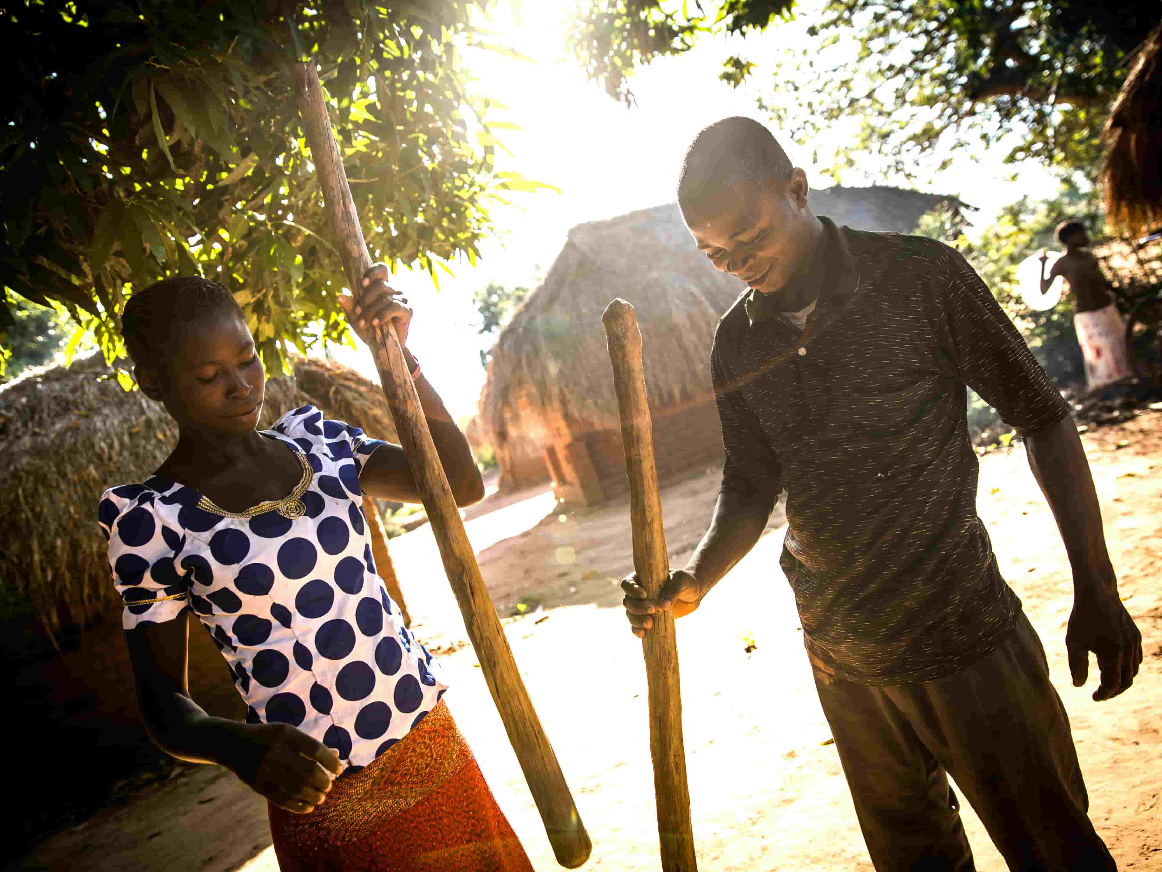 George Mukaly Ngoyi, 31, & Natalie Ngoyi, 20, prepare cassava flour together in the town of Pension, Manono Territory. George participated in gender equality training supported by Concern as part of our Graduation program in the area. The DRC is a patriarchal society in which male leadership is traditional and expected. The country is infamously harsh for women, with widespread sexual assault taking place during frequent wars and conflicts and GBV common in both urban and rural societies.