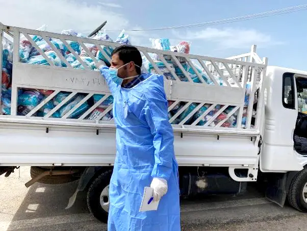 A distribution of hygiene kits to prevent COVID-19 at an IDP Camp in Kurdistan, Iraq