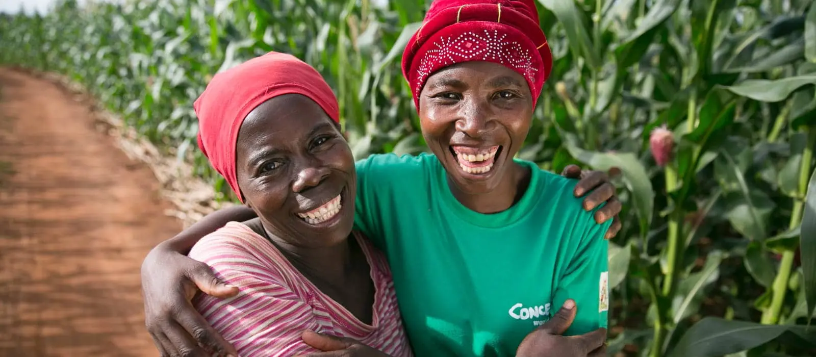 Esime Jenaia, a Lead Farmer for conservation Agriculture, at her plot in Chituke village, Mangochi, Malawi, with neighbor Esnart Kasimu. Concern has been carrying out Conservation Agriculture programming in Malawi since 2012, with the assistance of Accenture Ireland.