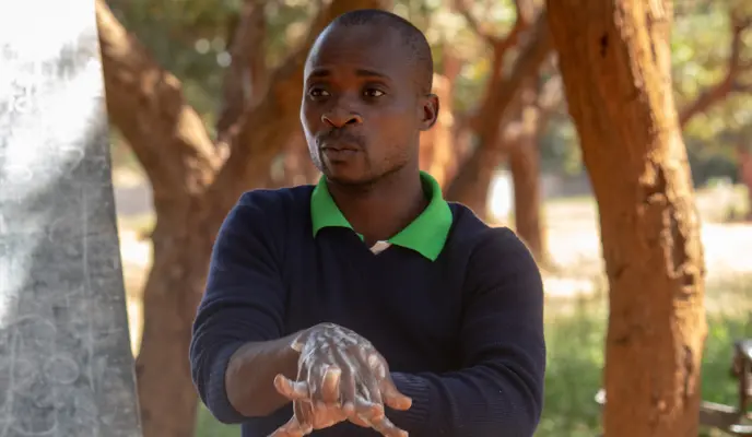 A hand-washing demonstration with Concern Malawi to help curb the spread of COVID-19.