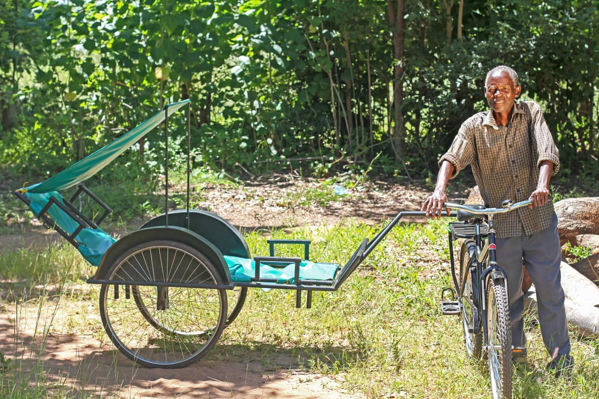 A man with a bicycle ambulance