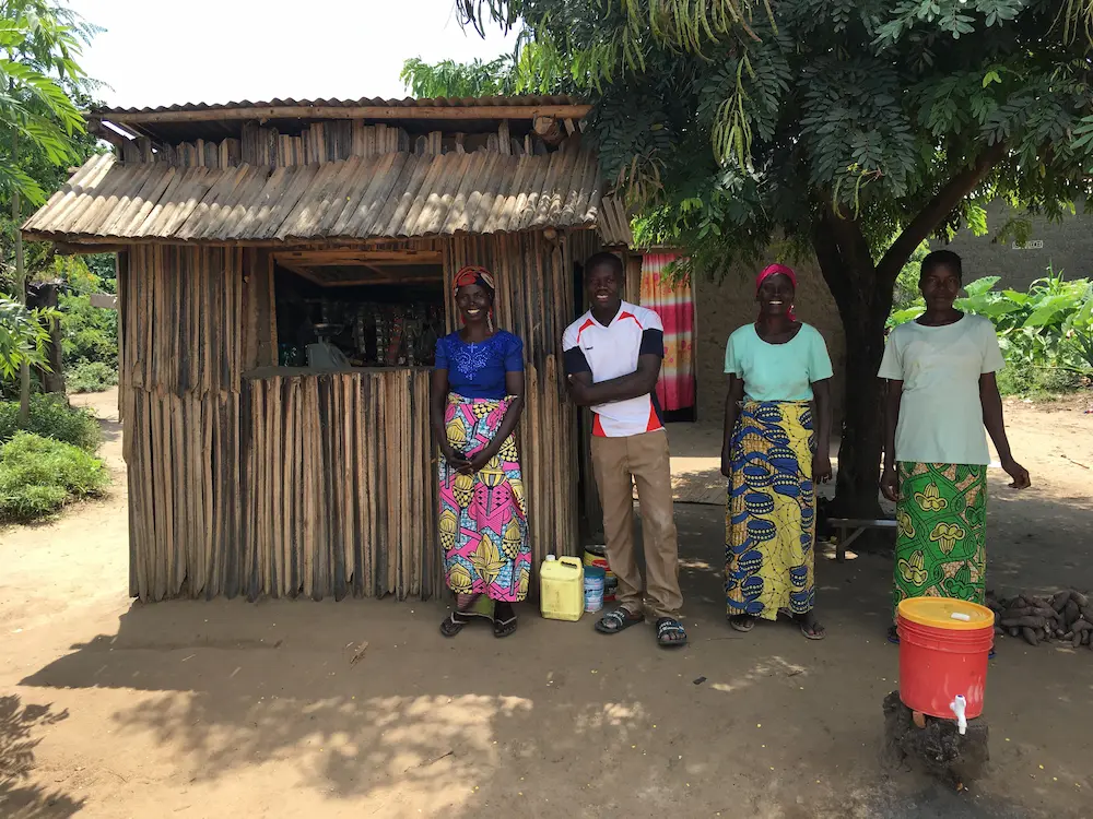 Concern Burundi Graduation participants in front of the shop they have set up as part of the program