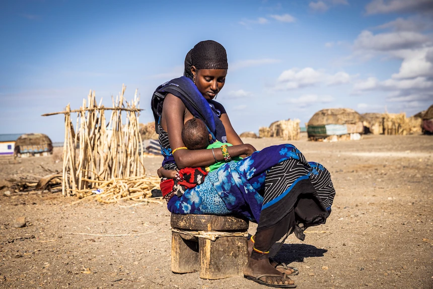 A kenyan woman breastfeeds her child