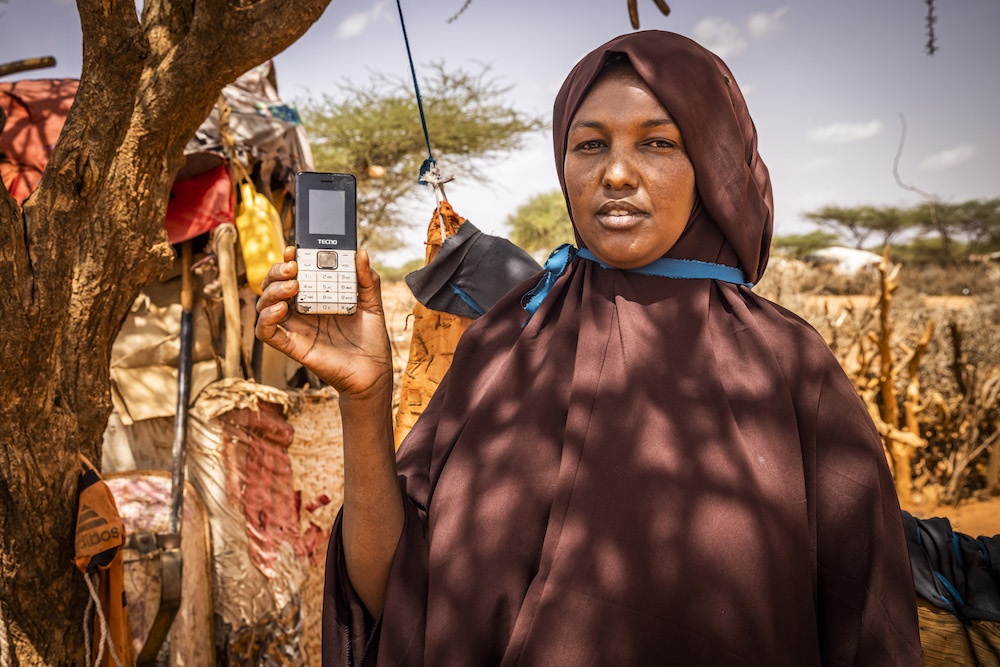 Kaltuun Ayaanle Maxamed (32) is married with six children in Somaliland. She and her family left home in 2017 when they lost their livestock due to drought. They lost about 100 animals, including camels, sheep, and goats, and have very little left. Kaltuun's husband went their herd and older sons in search of pasture, while she maintains a family home in Taghdeer. During the worst of the drought in Somalia, cash transfers from Concern helped Kaltuun make ends meet.