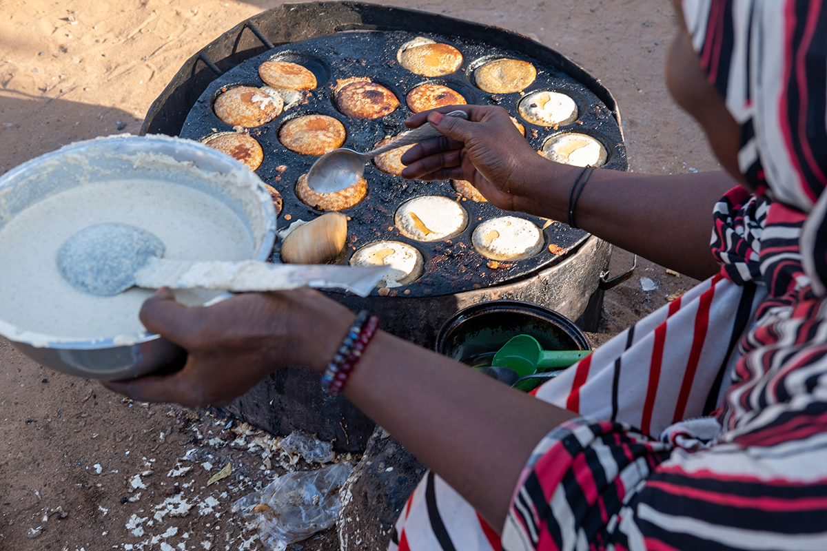 A woman makes breakfast in Tahoua, northwestern Niger. (Photo: Darren Vaughan/Concern Worldwide)