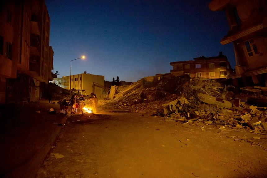 Survivors of the Feb 6th earthquake camp out in front of the ruins of their former home in Adiyaman in Turkey.