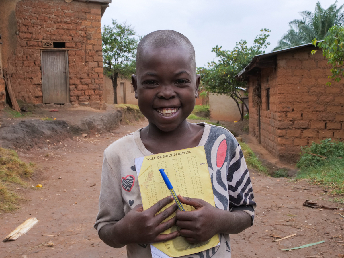 Virginie Irankunda (30) and François Nsaguye (39) have five children, only one of whom is at school. They live at the side of the road in a house that is in need of repair – the roof is made of grass with a plastic sheet underneath. (Photo: Eugene Ikua/Concern Worldwide)