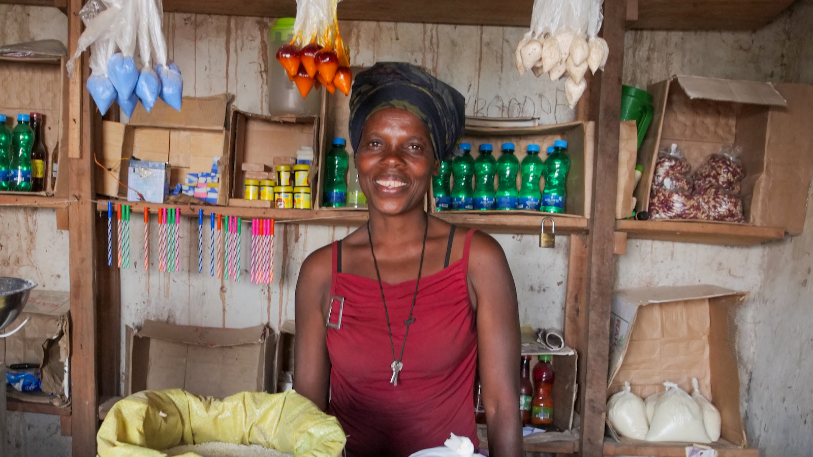 Mother-of-four Jacqueline Bacamugwanko (40) is a previous Graduation Programme participant. She has started her own businesses, including a grocery shop, where she sells cassava flour, and a restaurant. Jacqueline also has livestock and rents land to cultivate beans, maize and cassava. She is head of her household and has four children – three of whom are at school. (Photo: Eugene Ikua/Concern Worldwide)