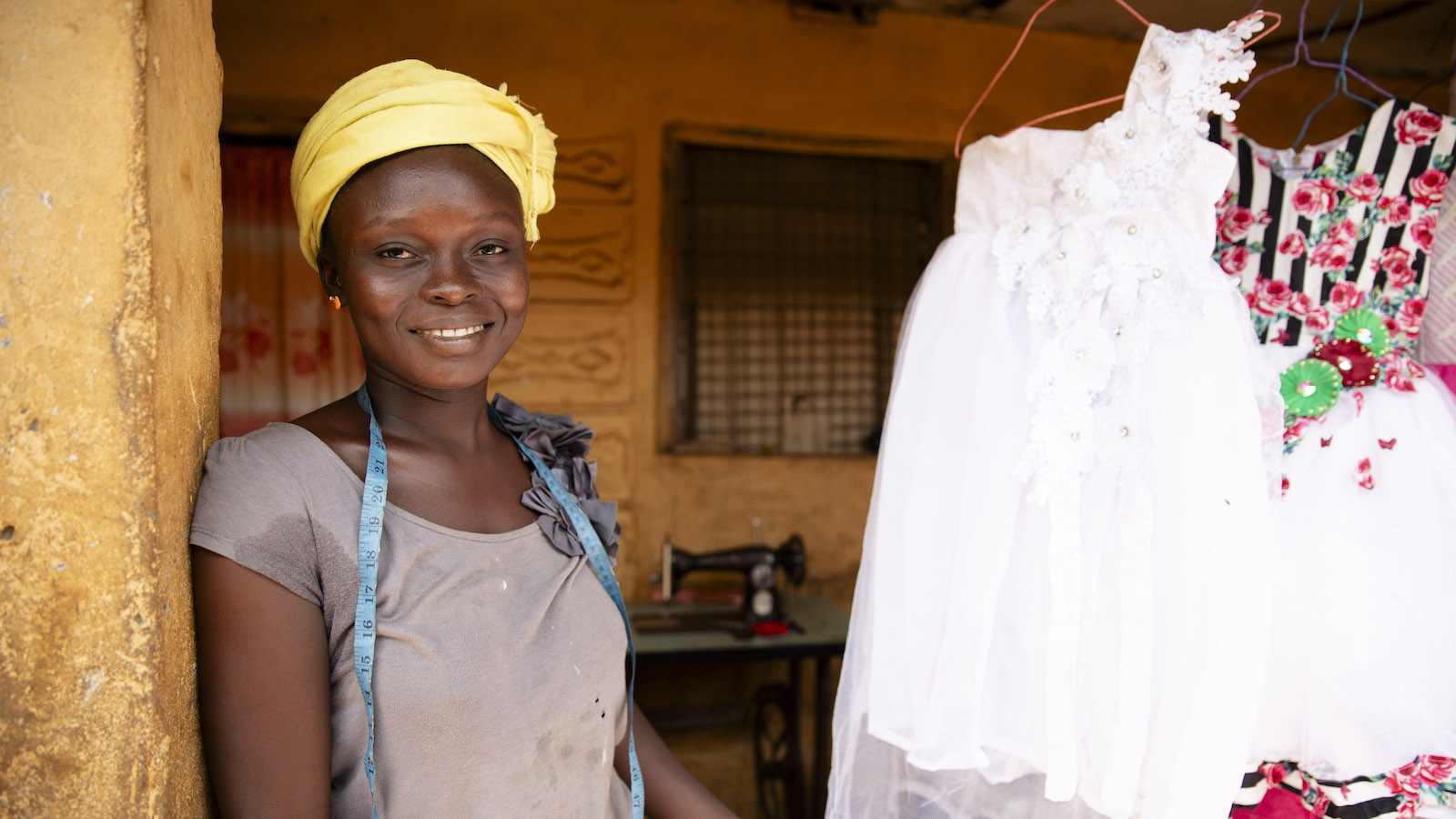 Hawa Sesay, a participant in the Concern-run EAGER programme in Freetown, Sierra Leone, which was designed to support out-of-school girls. She now has her own tailoring business. (Photo: Kieran McConville/Concern Worldwide)