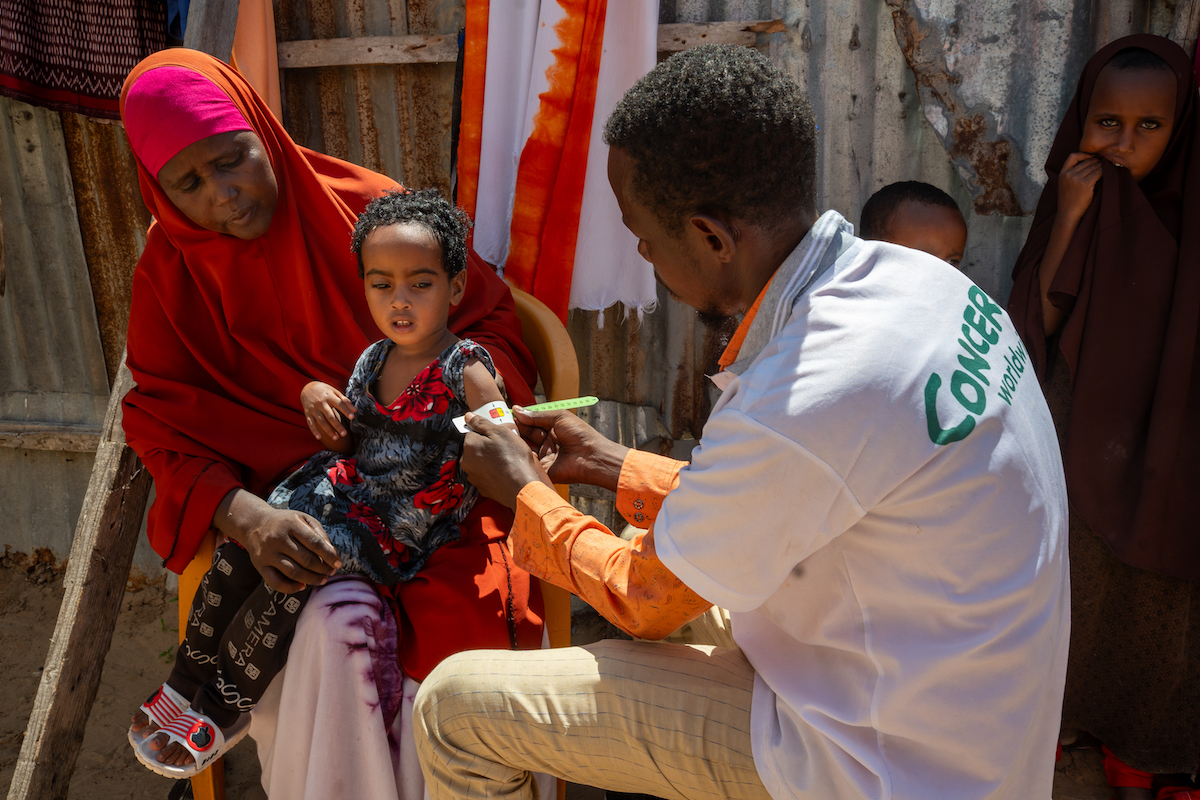 Calaso* (37) is a mother of five children. Calaso and her family moved to the refugee camp due to recurring droughts. She brought her child to the MCH (Maternal & Baby Health Centre) in Siinkadheer after her child became malnourished. (Photo: Mustafa Saeed/Concern Worldwide)