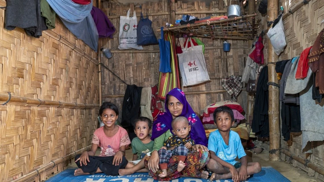 Rohingya refugee Kulsum* at home with her children at Camp 13, Cox's Bazar. (Photo: Saikat Mojumder/Concern Worldwide)