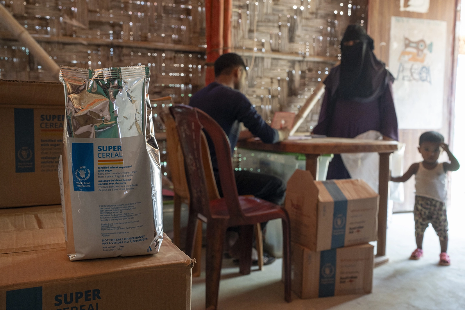 A Rohingya mother receives super cereal in the Concern nutrition center at Camp 19, Ukhiya, Cox's Bazar. (Photo: Saikat Mojumder/Concern Worldwide)