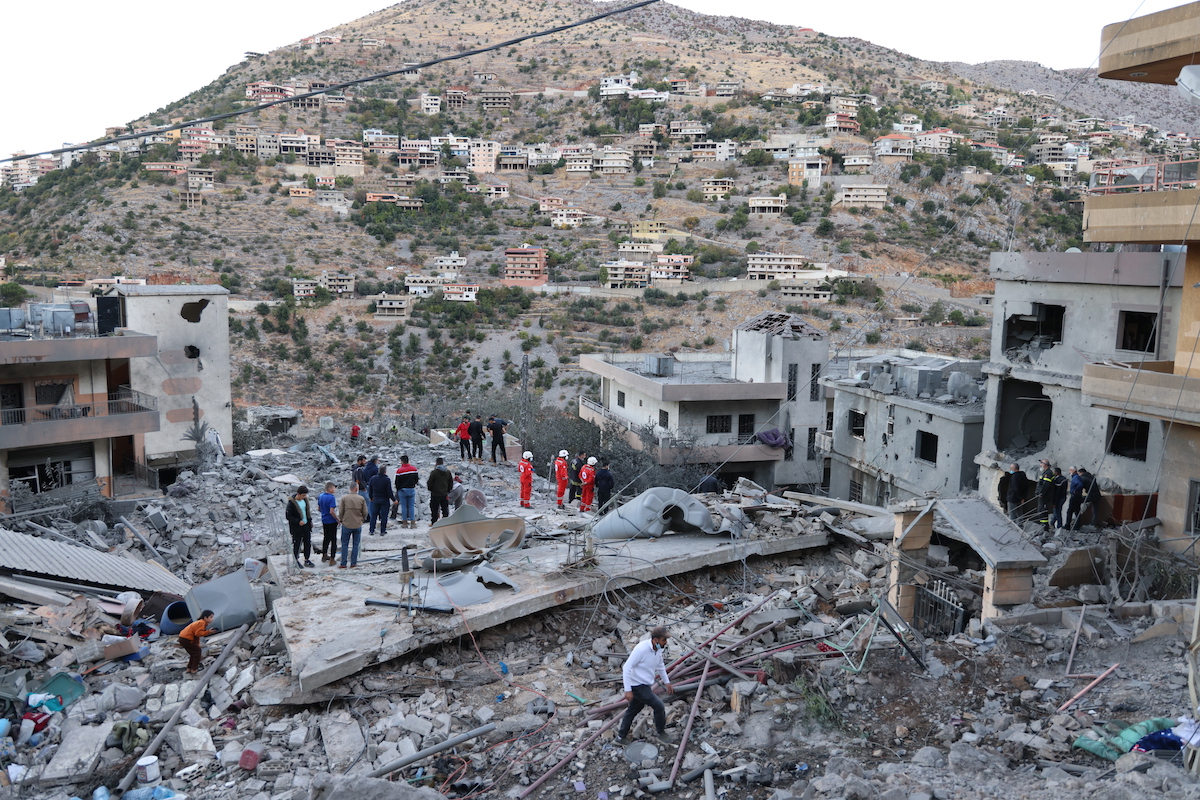 Lebanese Red Cross teams conducted search and rescue operations in the rubble of collapsed buildings following an attack in Nabatieh province on September 27, 2024. (Photo by Ramiz Dallah/Anadolu via Getty Images)