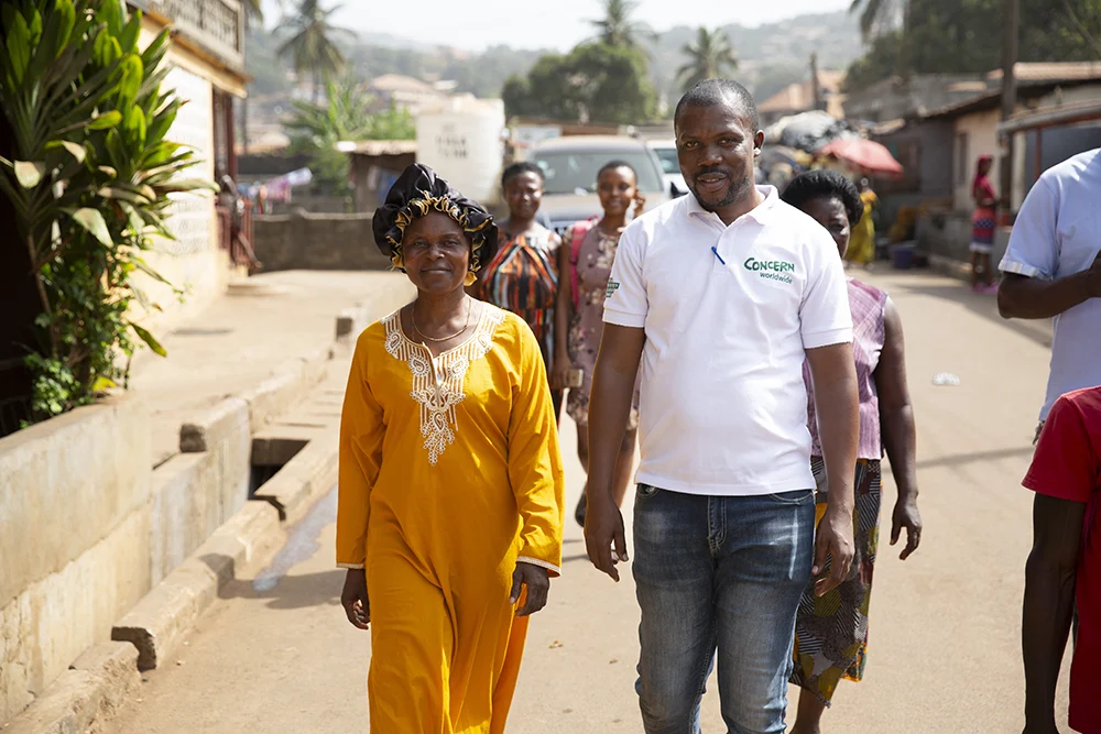 A community and leader and a Concern Worldwide staff member in Sierra Leone