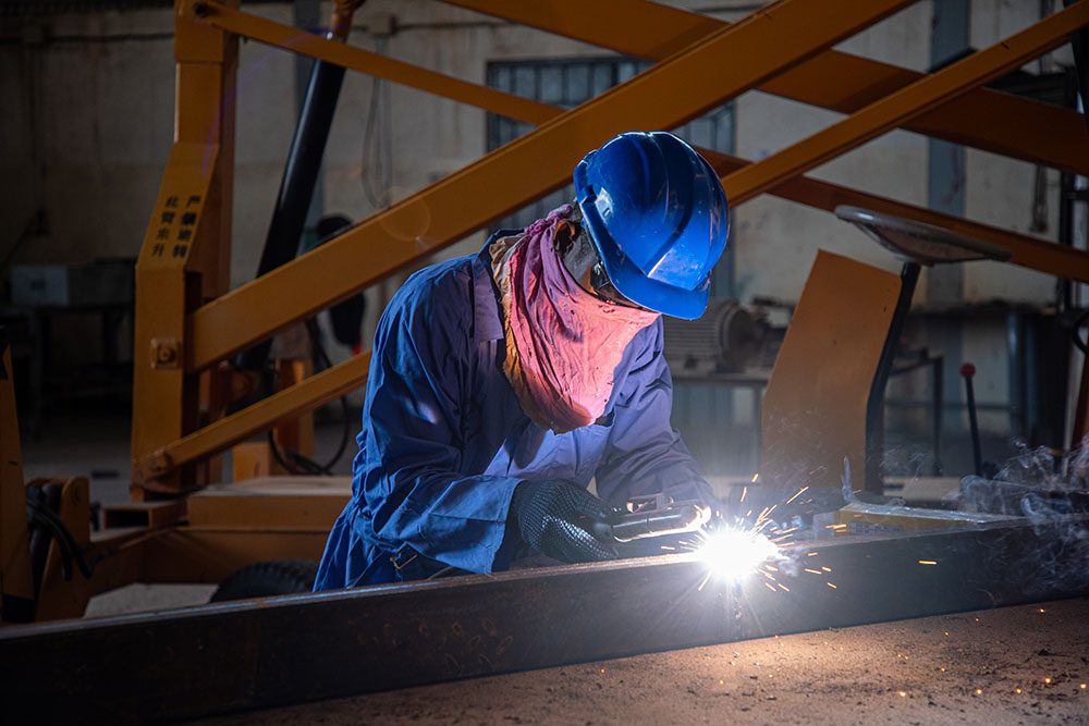 A  trainee welder in Somalia