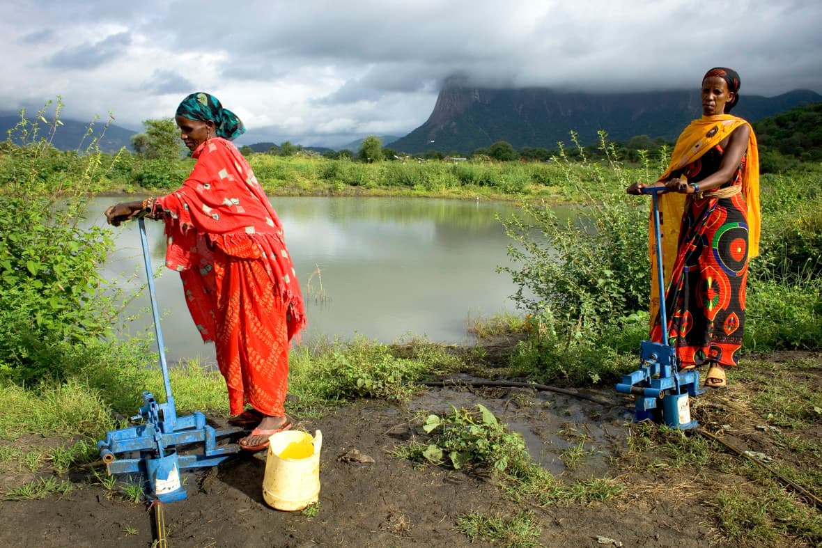 Women pump water