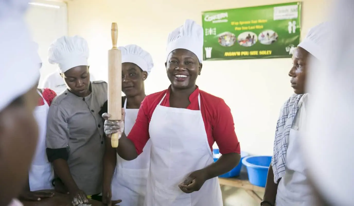 Dolores Remy leads a professional skills training course, part of the “Building Hope & Opportunities in Haiti” integrated urban program in Cité Soleil, Port au Prince