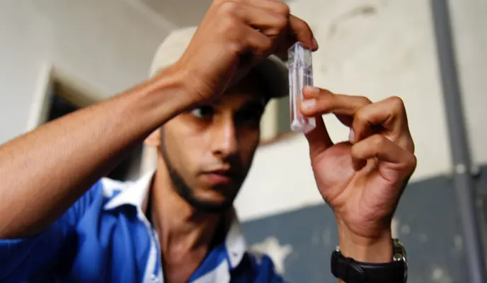 Man testing the quality of water in Lebanon