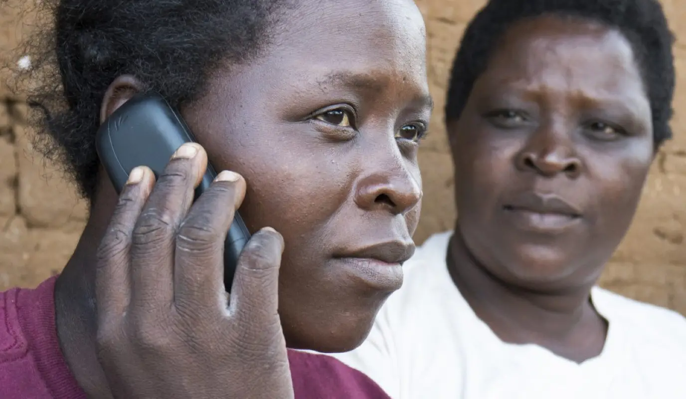 Two women, one on the phone