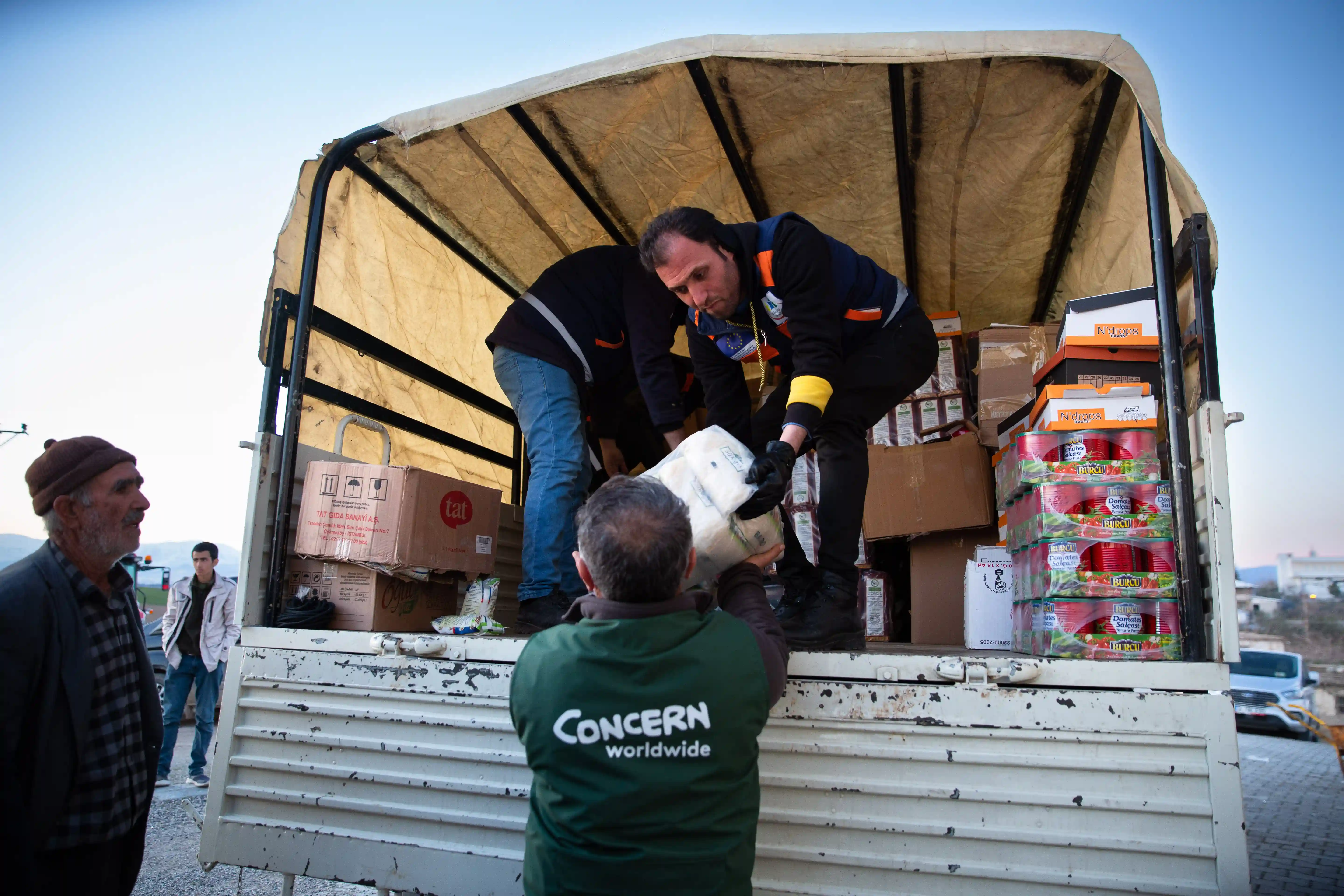 A distribution of food and other essential items to Sarıgül village in Adıyaman district, Türkiye. Photo: Kieran McConville/Concern Worldwide